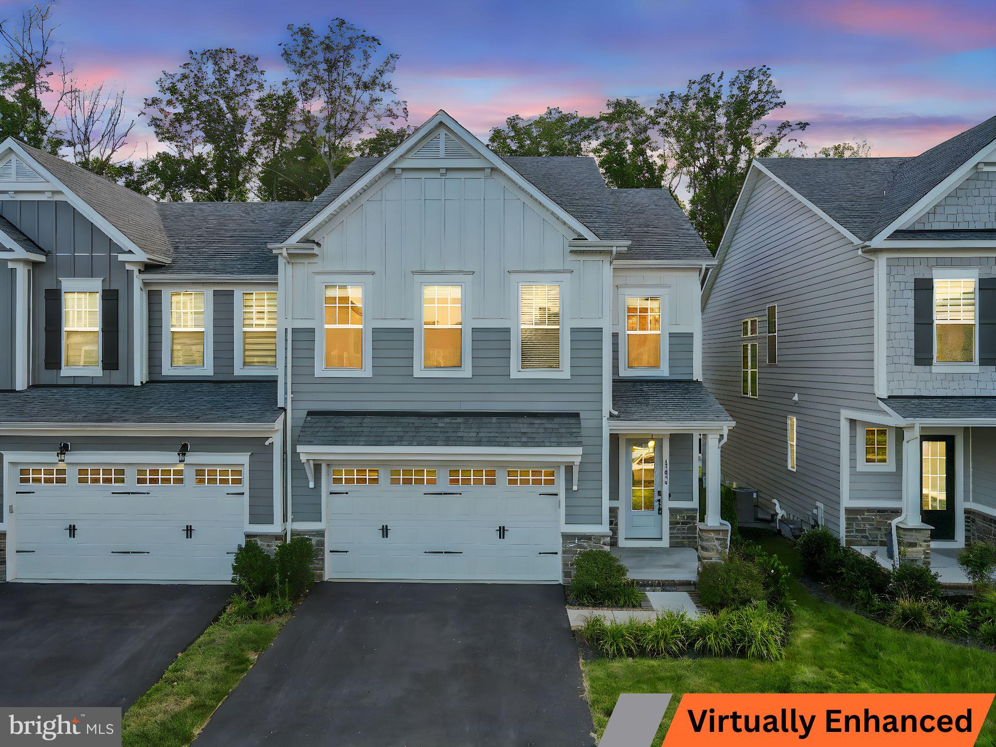 18080 Moss Garden Road Dumfries, VA 22026 - Photo 3 of 76 a front view of a house with a yard