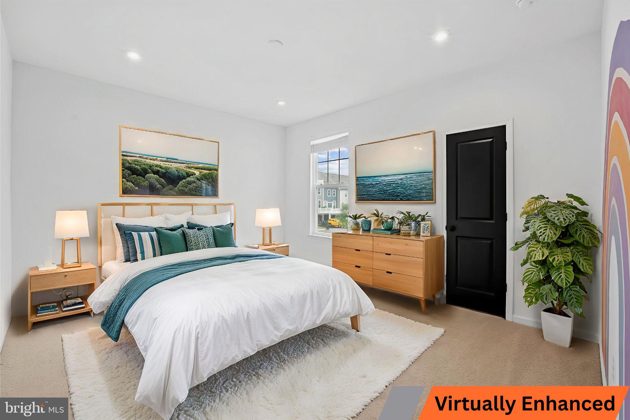 18080 Moss Garden Road Dumfries, VA 22026 - Photo 34 of 76 a spacious bedroom with a bed and a flat screen television