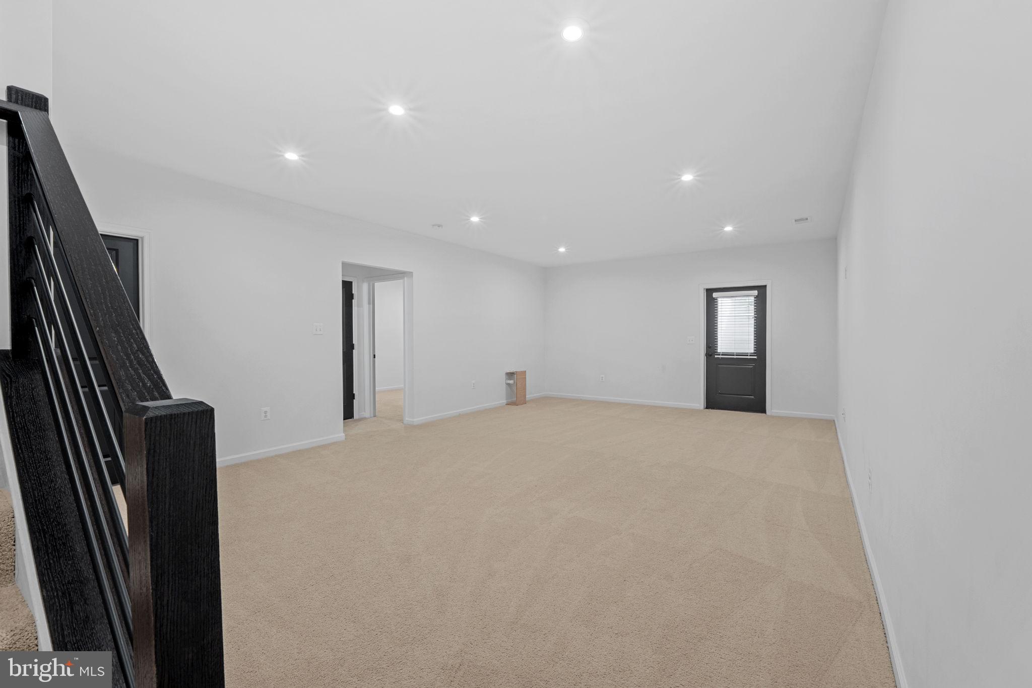 18080 Moss Garden Road Dumfries, VA 22026 - Photo 40 of 76 a view of empty room with wooden floor