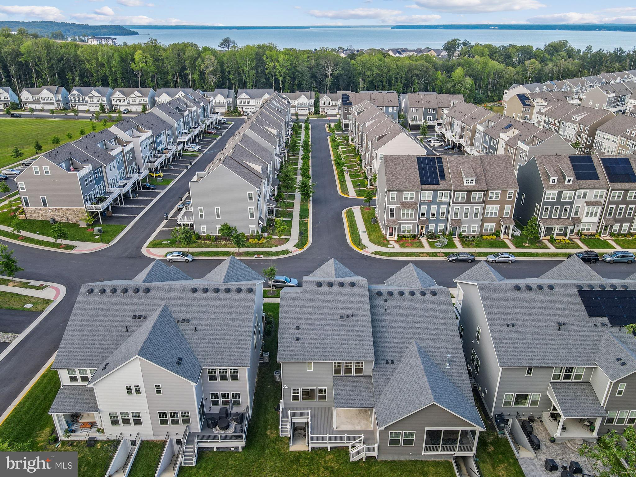 18080 Moss Garden Road Dumfries, VA 22026 - Photo 54 of 76 an aerial view of residential houses with outdoor space and parking