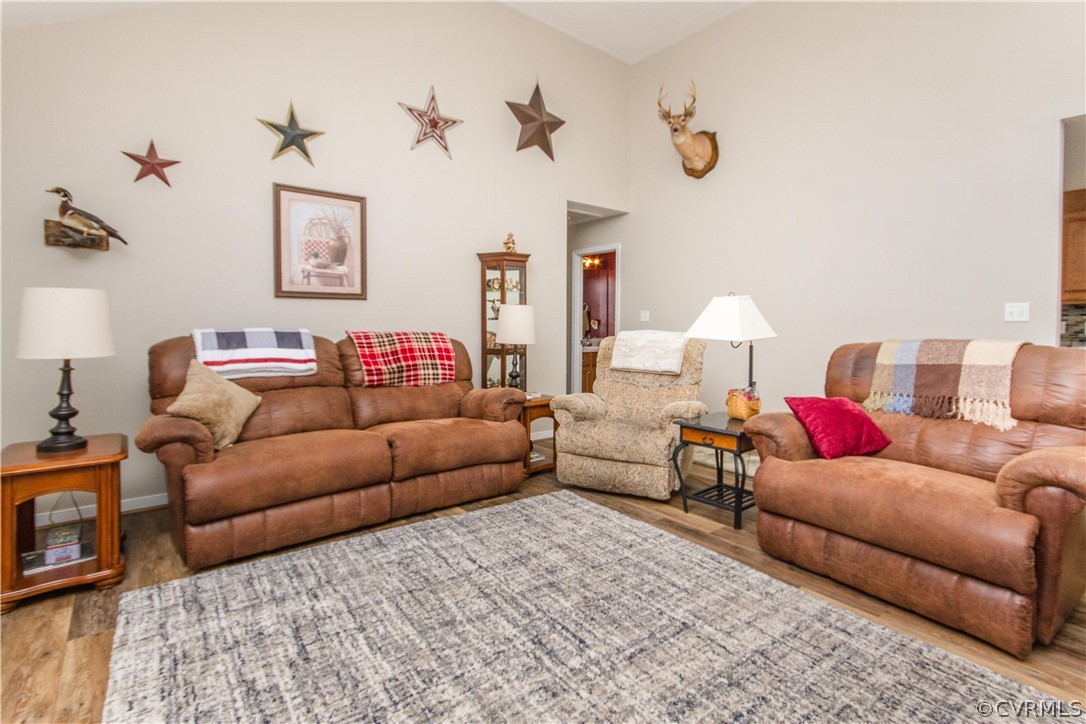 19725 Carson Ruritan Road Carson, VA 23830 - Photo 12 of 36 a living room with furniture and a couch