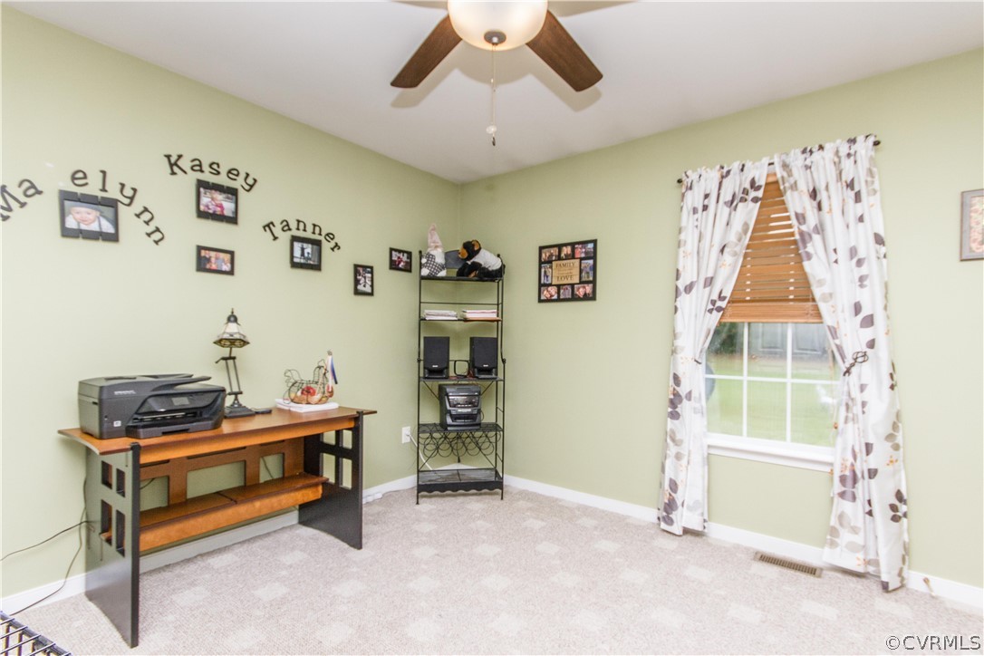 19725 Carson Ruritan Road Carson, VA 23830 - Photo 21 of 36 a room with furniture and white walls
