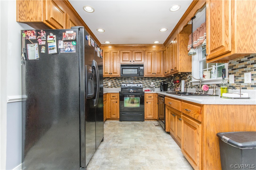 19725 Carson Ruritan Road Carson, VA 23830 - Photo 3 of 36 a kitchen with stainless steel appliances granite countertop a refrigerator a stove and a sink