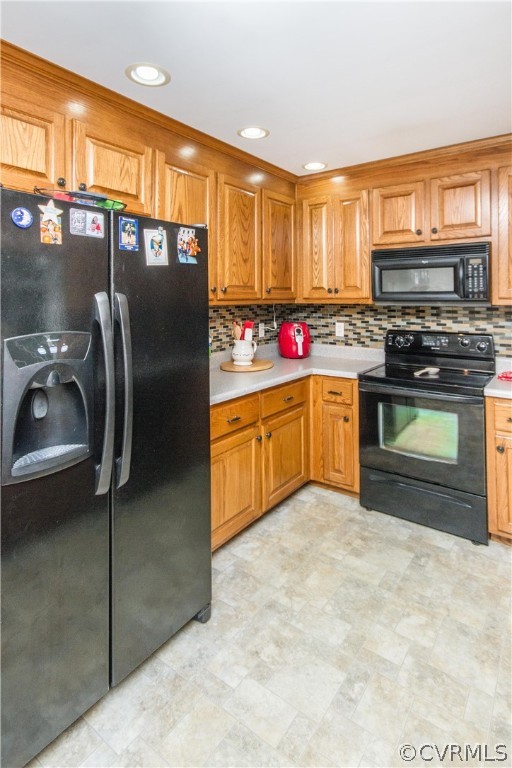 19725 Carson Ruritan Road Carson, VA 23830 - Photo 6 of 36 a kitchen with stainless steel appliances granite countertop a stove a sink and a refrigerator