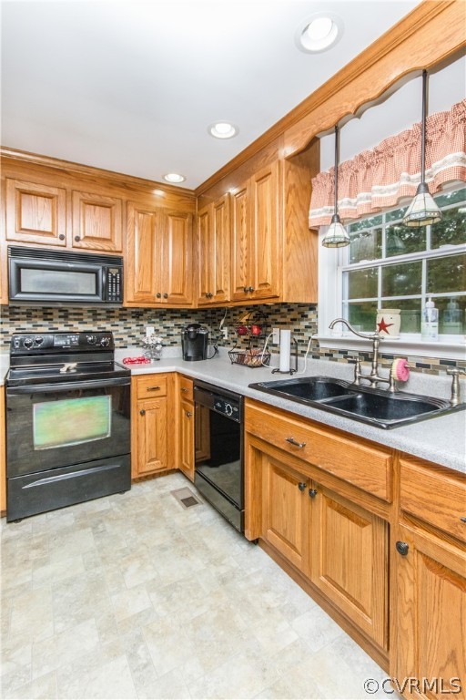 19725 Carson Ruritan Road Carson, VA 23830 - Photo 7 of 36 a kitchen with stainless steel appliances granite countertop a stove a sink and a refrigerator