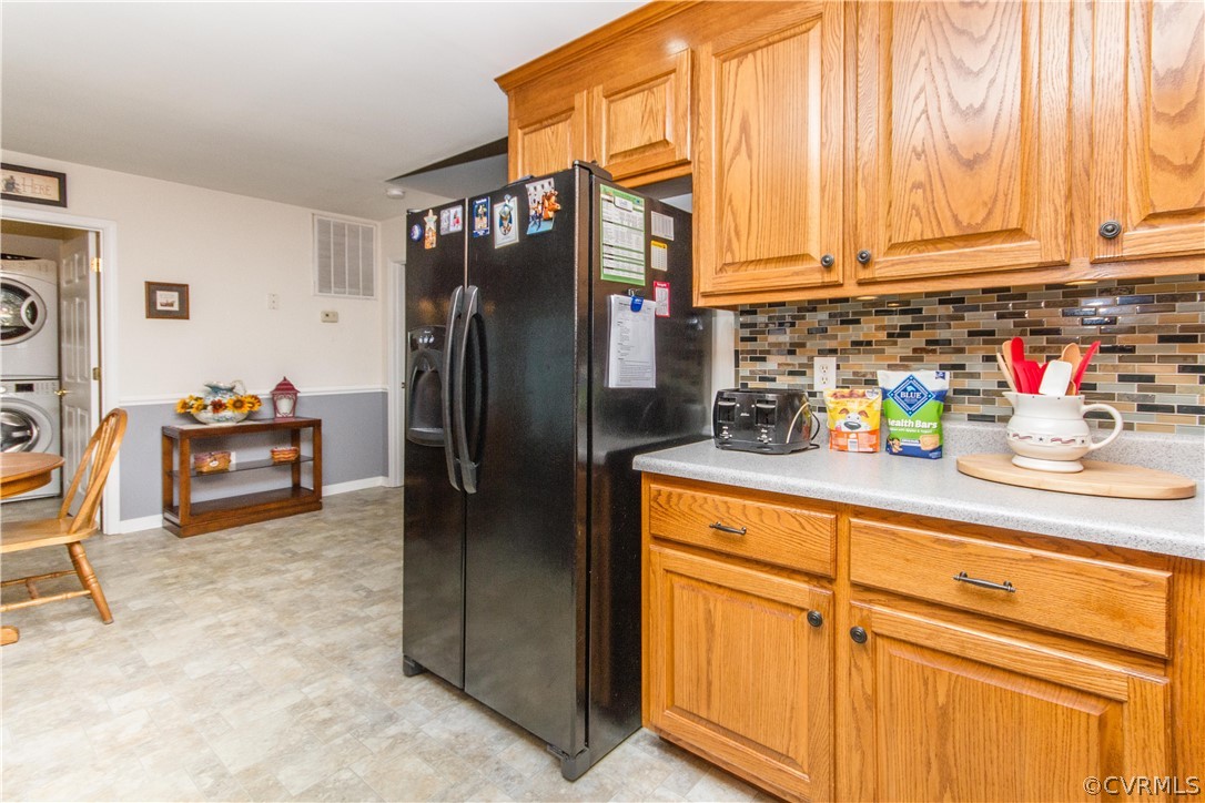 19725 Carson Ruritan Road Carson, VA 23830 - Photo 8 of 36 a kitchen with stainless steel appliances a refrigerator and cabinets