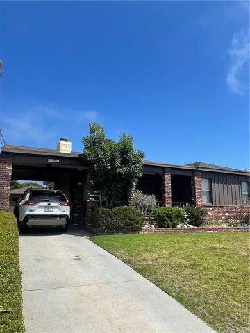 a car parked in front of a house