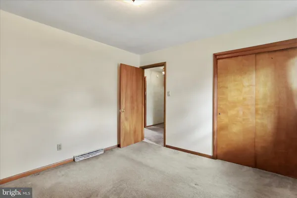 an empty room with closet