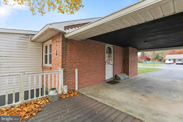 a view of backyard with garage