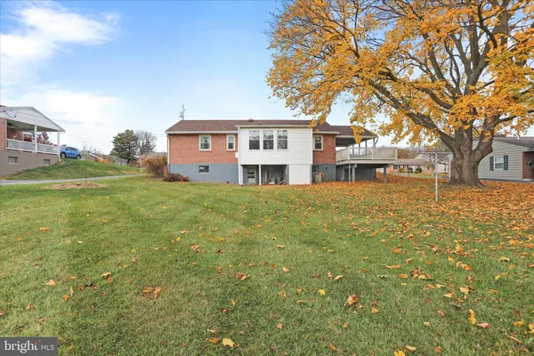 a view of a house with a big yard