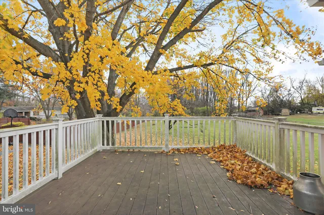 a view of balcony with wooden floor