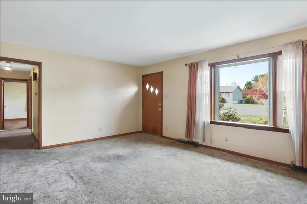 an empty room with window
