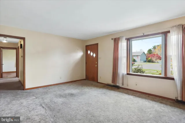 an empty room with window