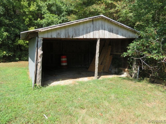 12608 Beach Road Chesterfield, VA 23832 - Photo 14 of 37 a view of a small house with backyard and trees