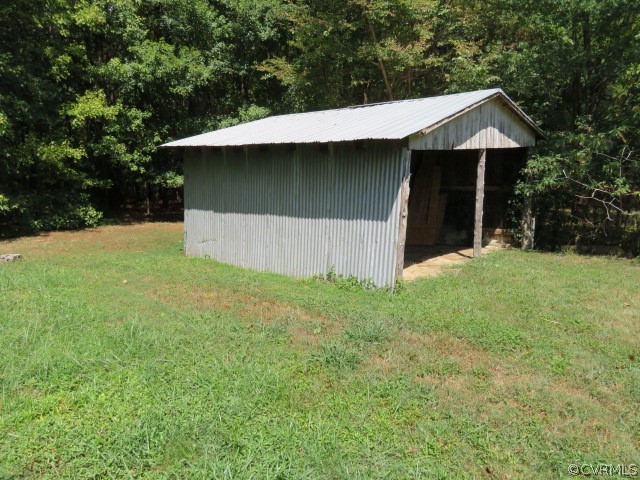 12608 Beach Road Chesterfield, VA 23832 - Photo 15 of 37 a front view of a house with a yard and trees