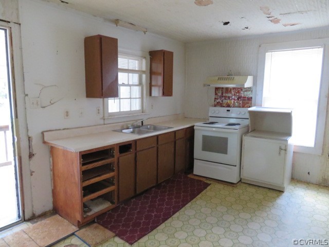 12608 Beach Road Chesterfield, VA 23832 - Photo 24 of 37 a kitchen with a stove and a sink