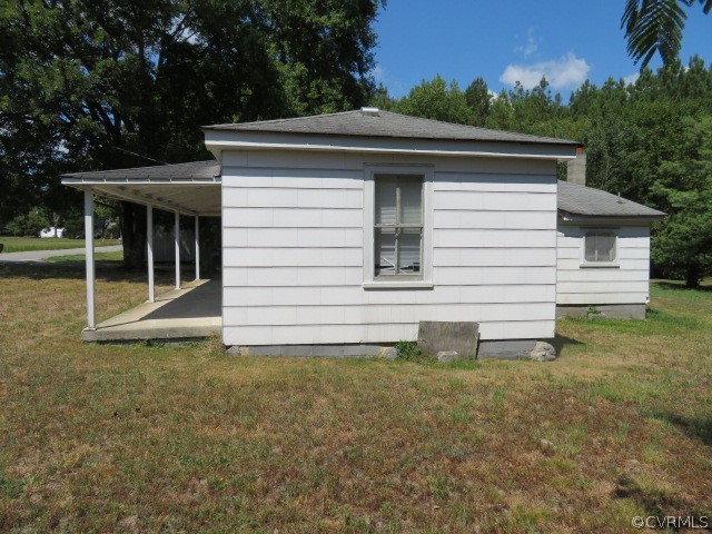 12608 Beach Road Chesterfield, VA 23832 - Photo 3 of 37 a small white house with a white roof