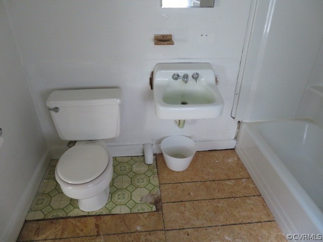 12608 Beach Road Chesterfield, VA 23832 - Photo 34 of 37 a bathroom with a toilet and a rug