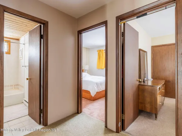 a bathroom with a sink a toilet and bathtub