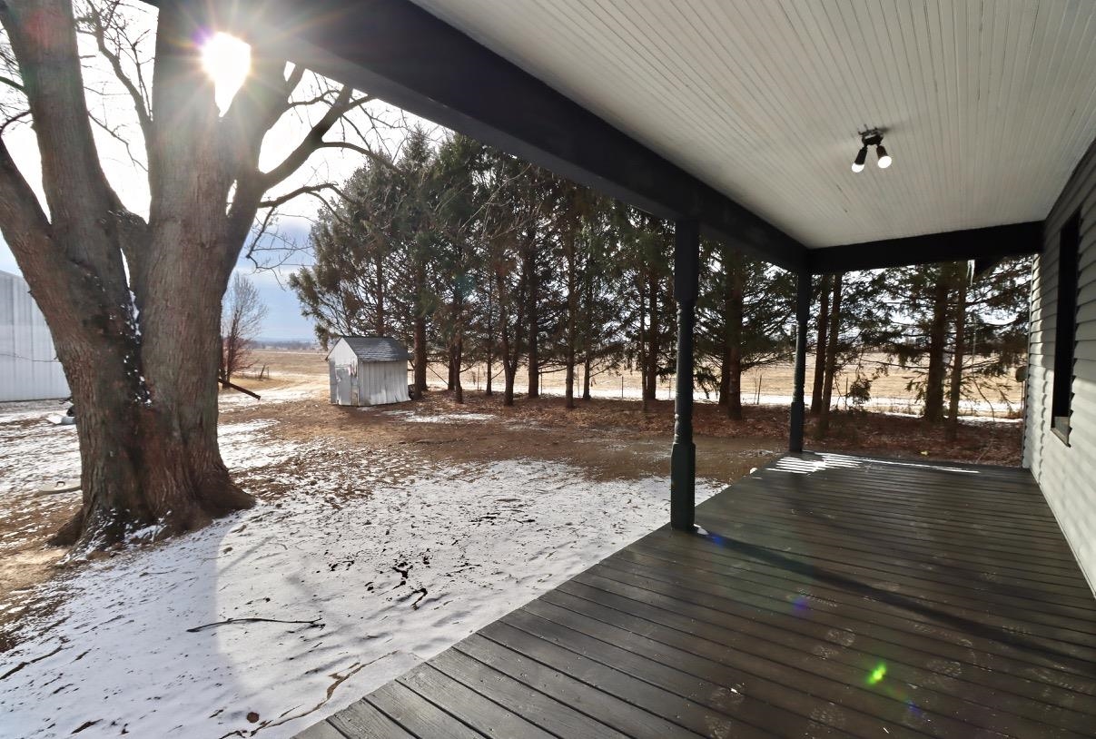 15738 Farm School Road Durand, IL 61024 - Photo 16 of 20 a view of outdoor space with deck