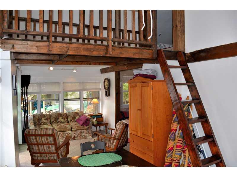 114 Rocky Cove Road Lebanon, ME 04027 - Photo 21 of 26 Family Room. STAIRS to Loft