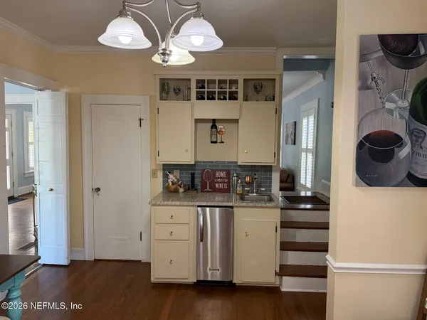 a view of a kitchen and dining room