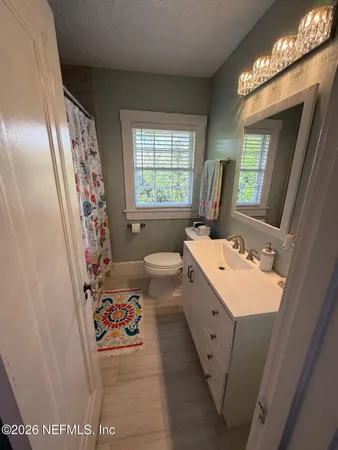 a very nice looking room with many windows