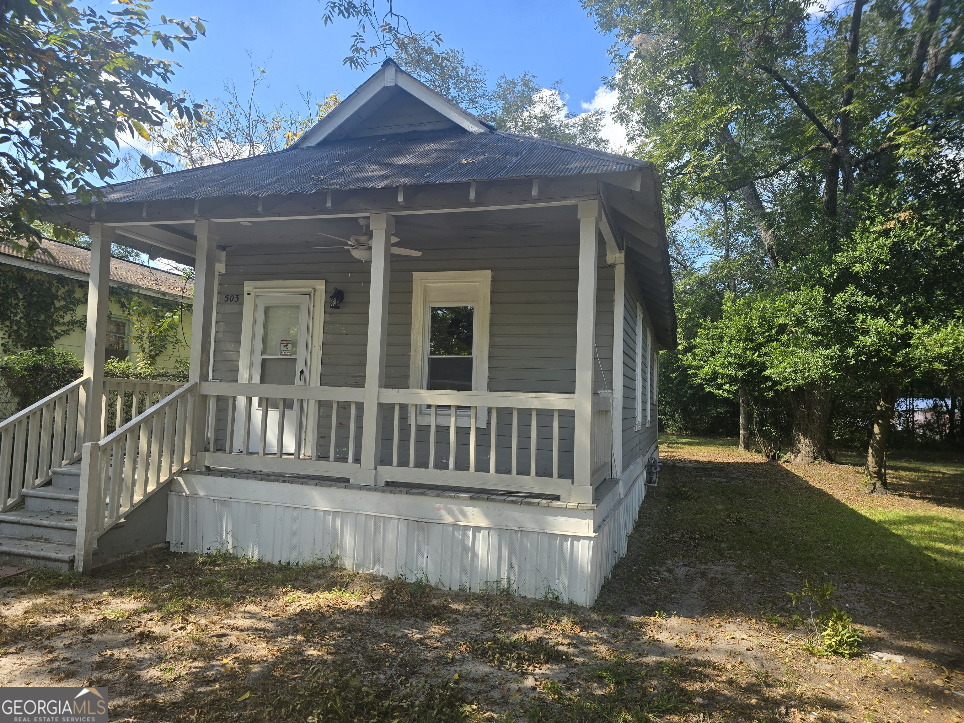 503 Tennessee Street Dublin, GA 31021 - Photo 1 of 8 a view of a house with a small yard