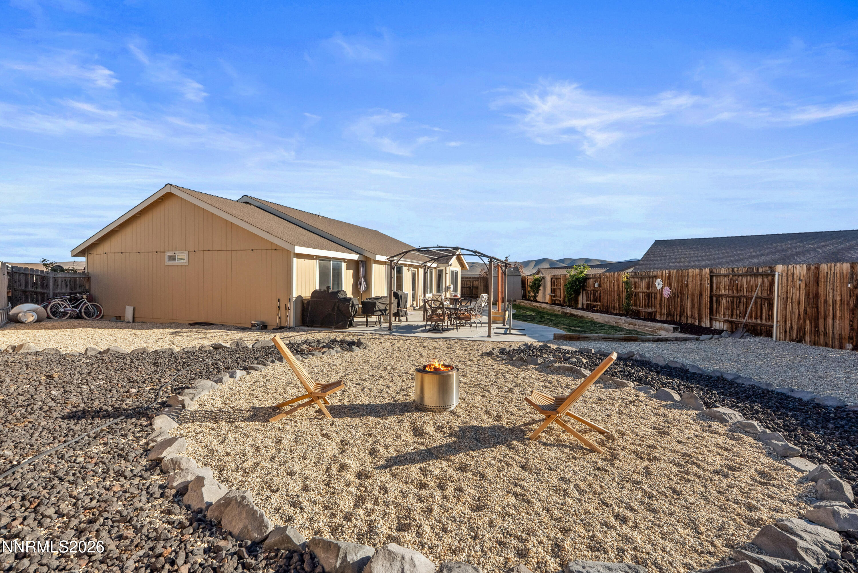 552 Spur Court Fernley, NV 89408 - Photo 41 of 46 a view of a house with backyard and sitting area