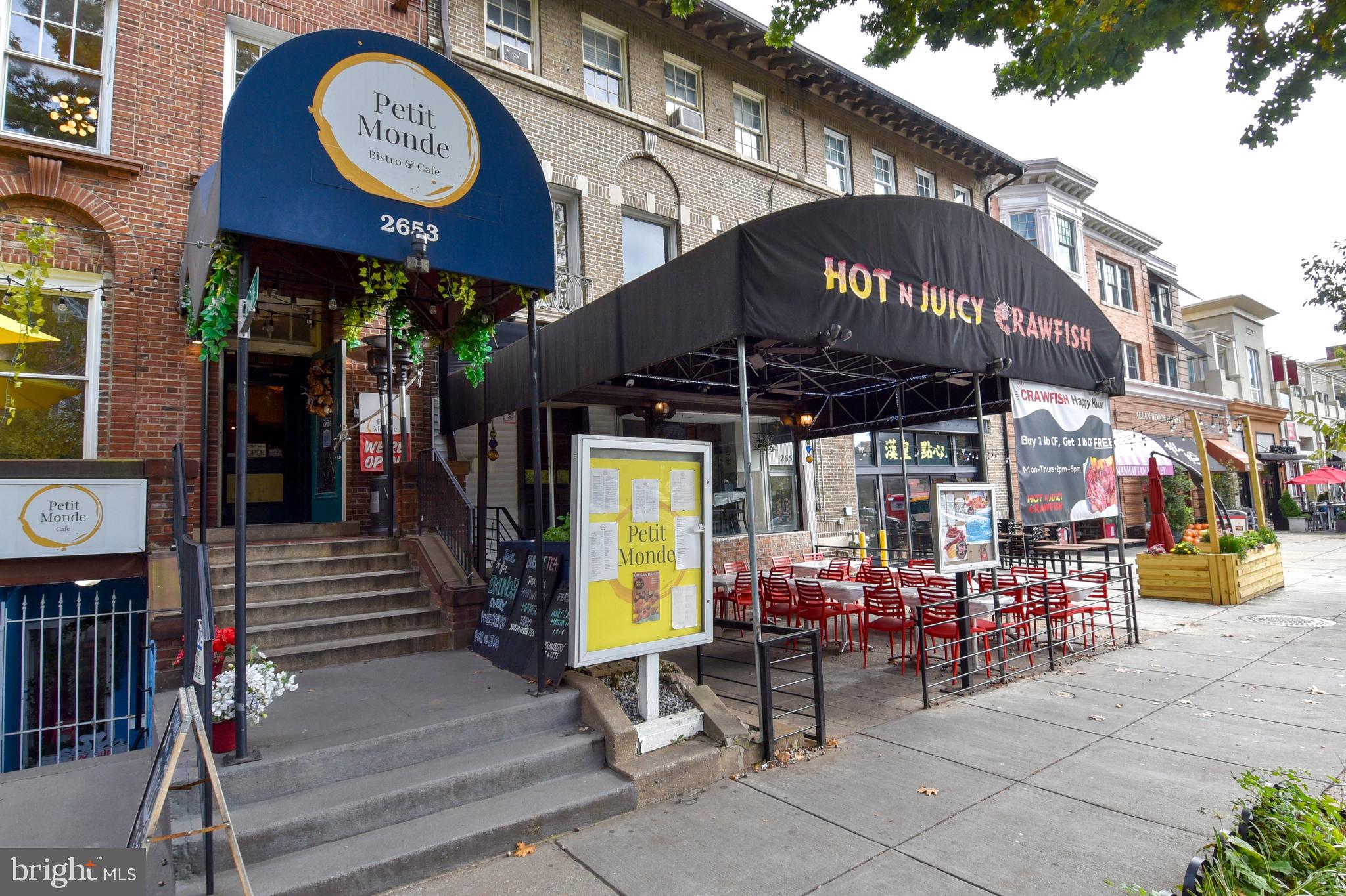 2725 Connecticut Avenue Northwest, Unit 403 Washington, DC 20008 - Photo 19 of 25 a view of a cafe with table and chairs