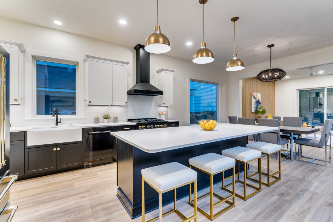 3101 Lyons Road Austin, TX 78702 - Photo 2 of 11 a kitchen with a table and chairs in it