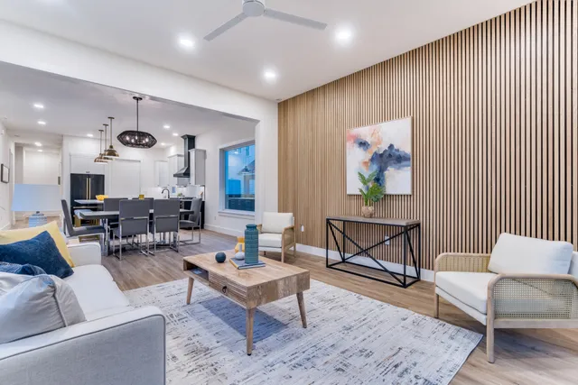 a living room with furniture and a rug