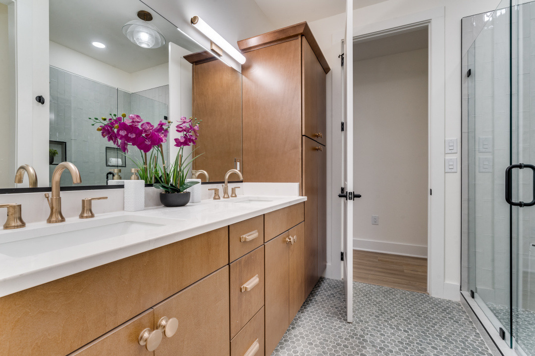 3101 Lyons Road Austin, TX 78702 - Photo 6 of 11 a bathroom with a sink vanity and a mirror
