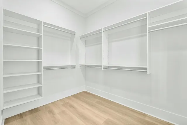 a view of an empty walk in closet