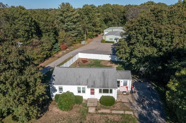 a view of a back yard of the house
