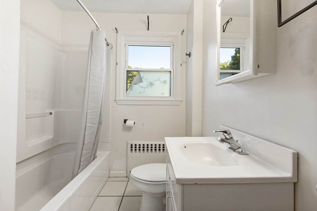 150 Gilbert Street Mansfield, MA 02048 - Photo 11 of 41 a bathroom with a sink toilet and shower