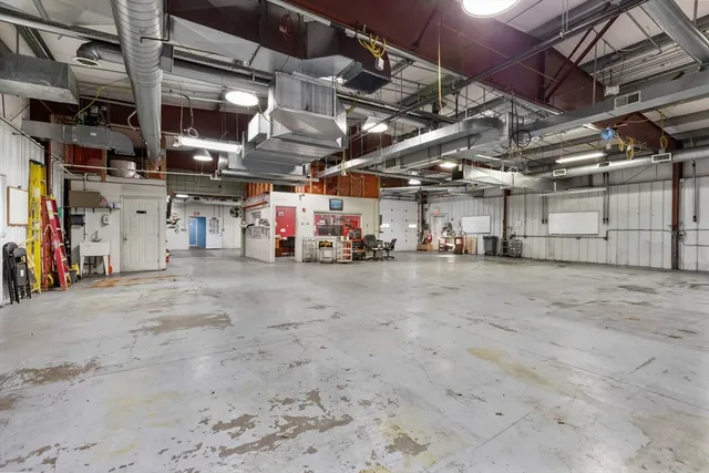 a view of a empty room with storage