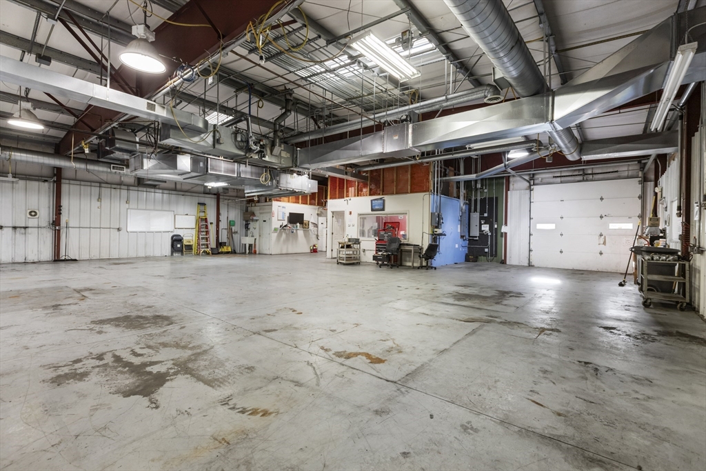 150 Gilbert Street Mansfield, MA 02048 - Photo 27 of 41 a view of parking garage with cars