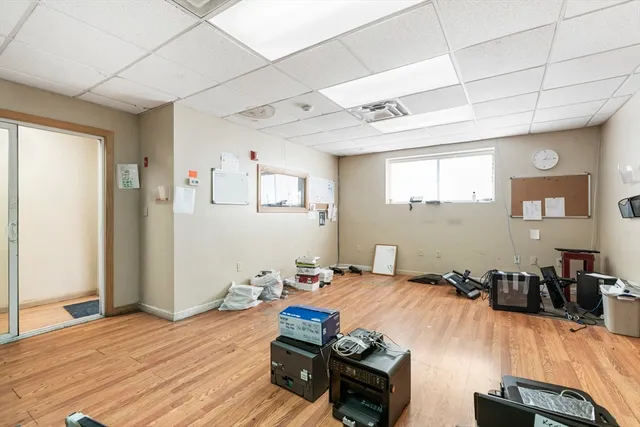 a bathroom with a toilet sink and a view of bathroom