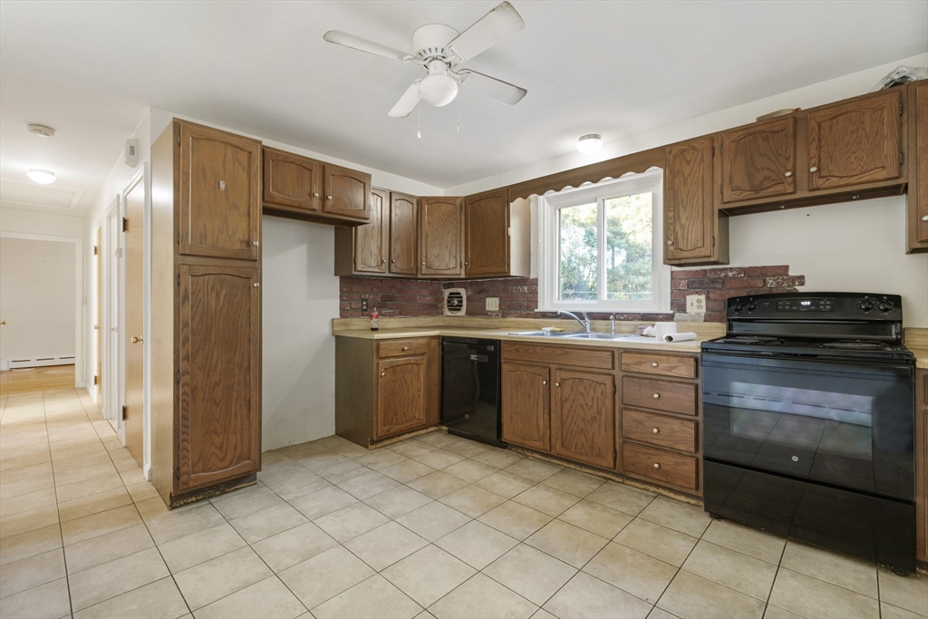 150 Gilbert Street Mansfield, MA 02048 - Photo 7 of 41 a kitchen with a sink cabinets and window