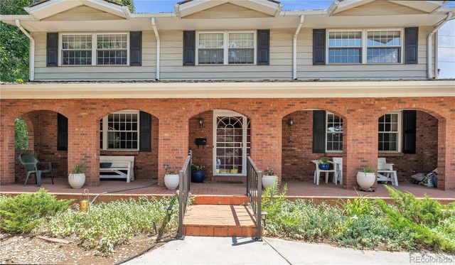 front view of a building with a porch