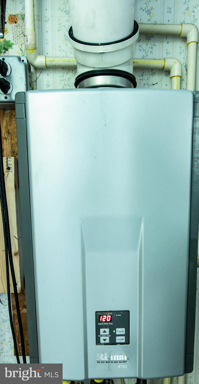 208 Carnoustie Road Dover, DE 19904 - Photo 21 of 22 Energy efficient on demand gas water heater!