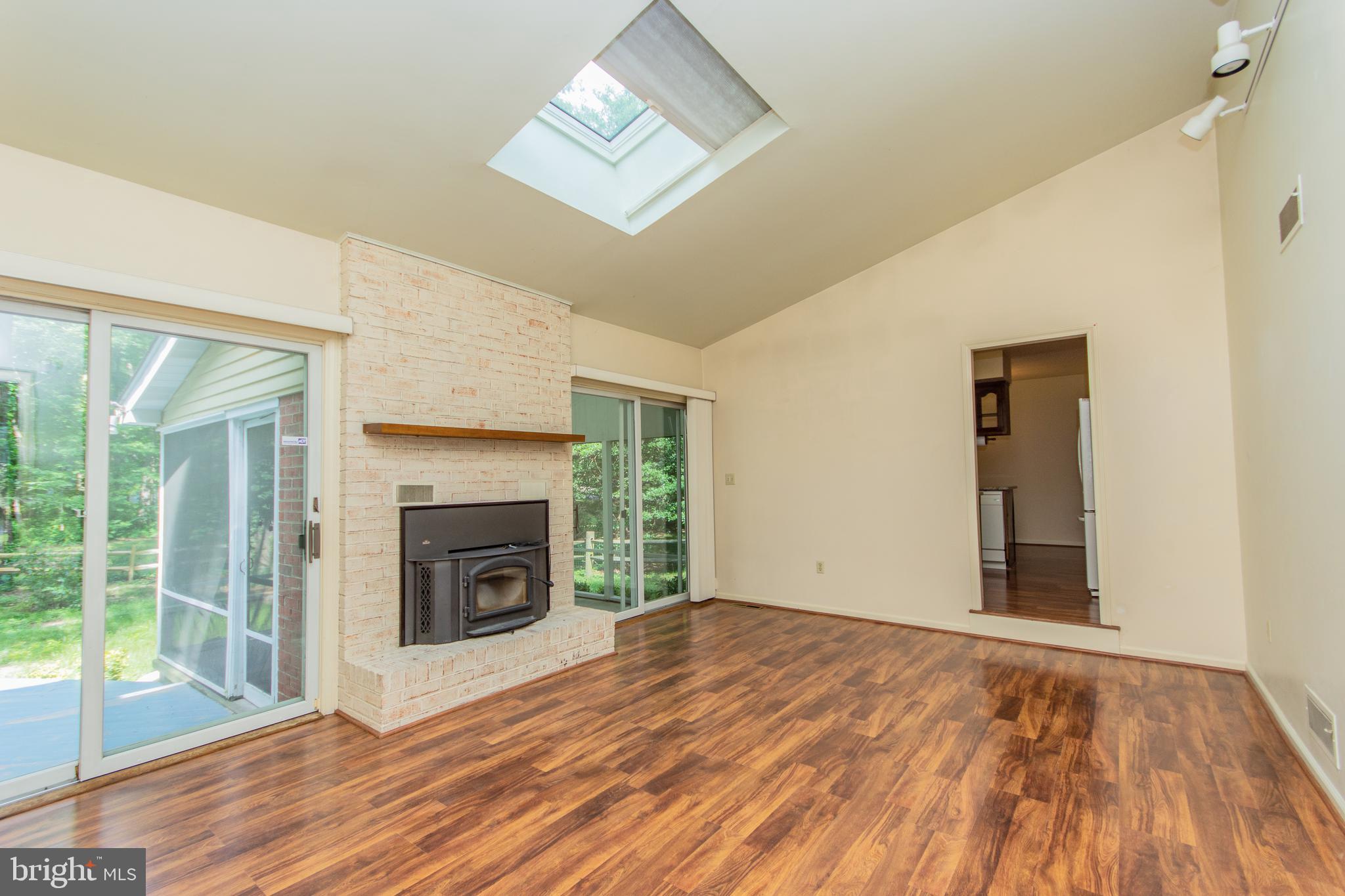 208 Carnoustie Road Dover, DE 19904 - Photo 8 of 22 Wood burning stove with blower,high ceilings