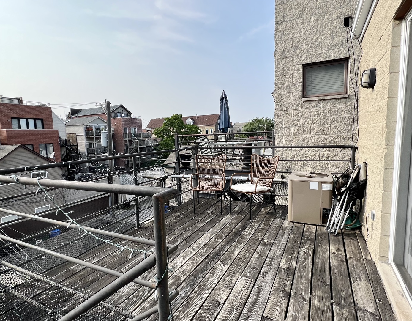 1238 North Cleaver Street, Unit 3 Chicago, IL 60642 - Photo 16 of 16 a view of roof deck with seating space and wooden floor