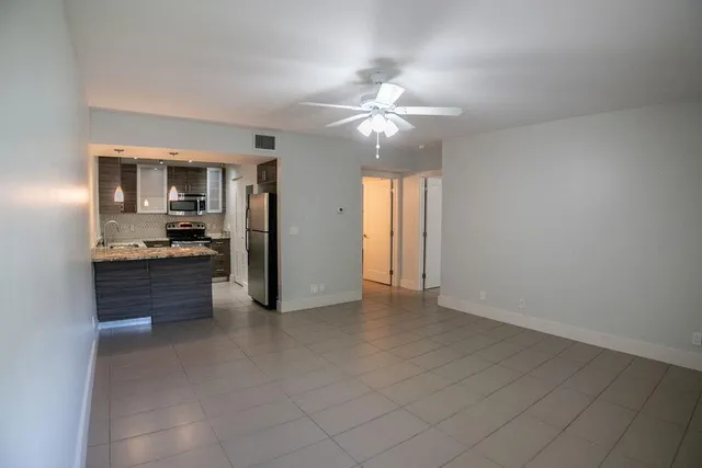 a view of kitchen and windows