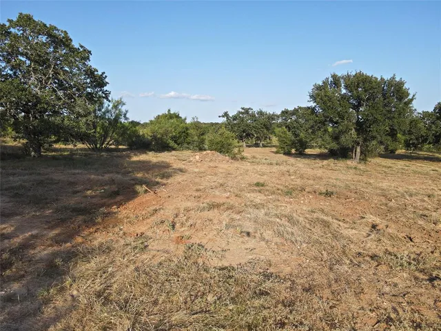a view of empty room with mountain view