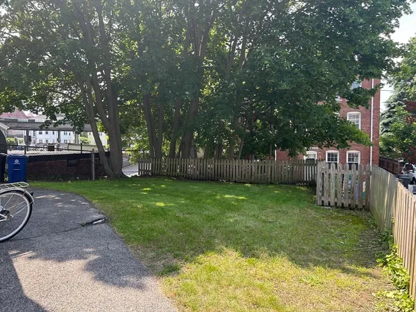 a view of a backyard with a garden