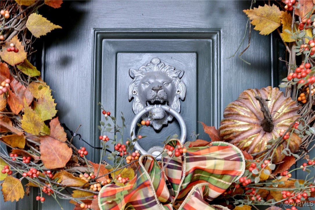 108 Harlech Williamsburg, VA 23188 - Photo 17 of 50 closeup of a house with a fireplace and potted plants