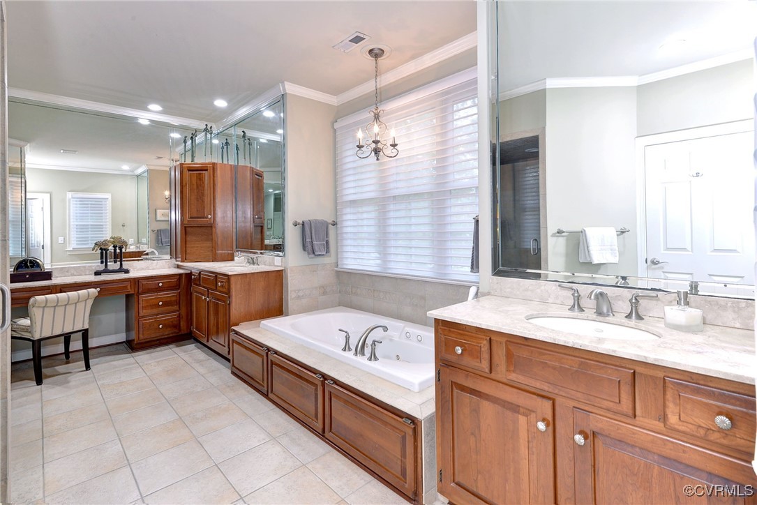 108 Harlech Williamsburg, VA 23188 - Photo 46 of 50 a large white bathroom with a double vanity sink mirror and bathtub
