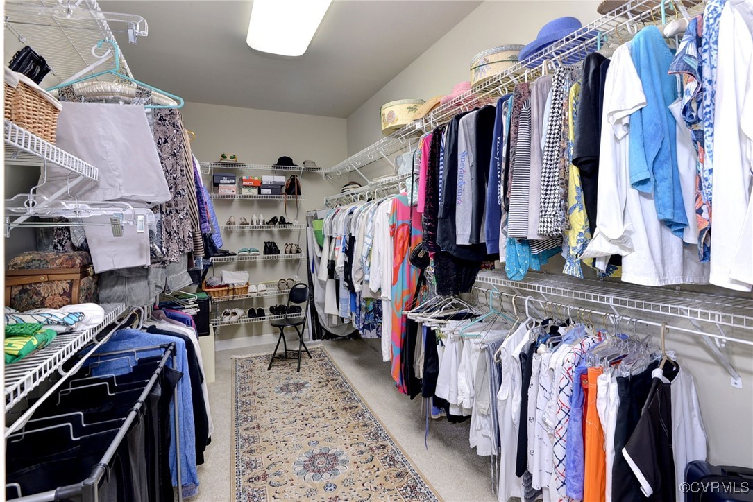 108 Harlech Williamsburg, VA 23188 - Photo 47 of 50 a view of walk in closet with clothes and shoes